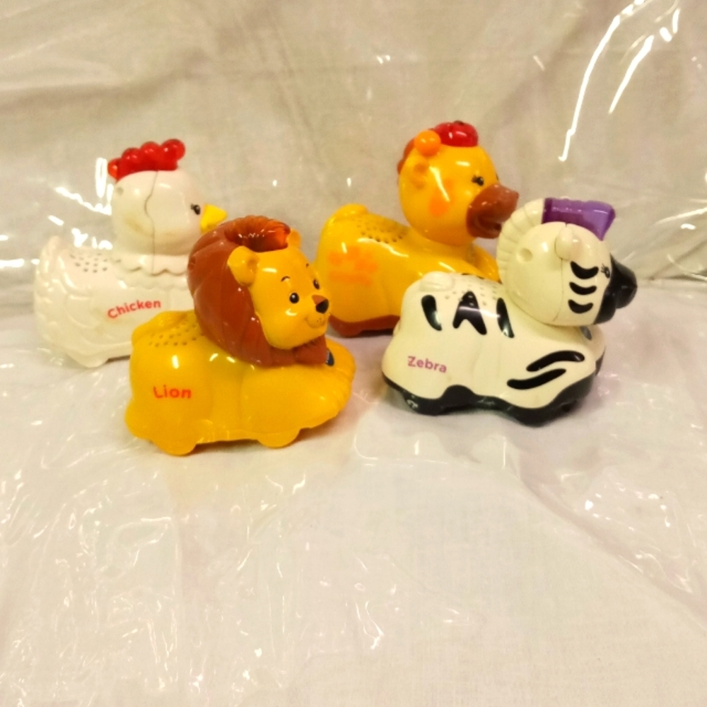 (4) VTech Go! Go! Smart Wheel Animals, Zebra, Chicken, Giraffe, Lion
